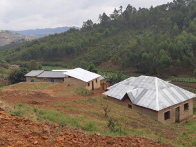 A picture of a village in a hills
